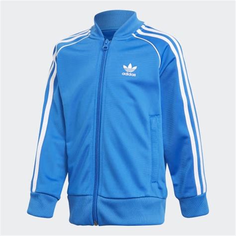 buzo adidas originals tricolor marron azul franja blanca